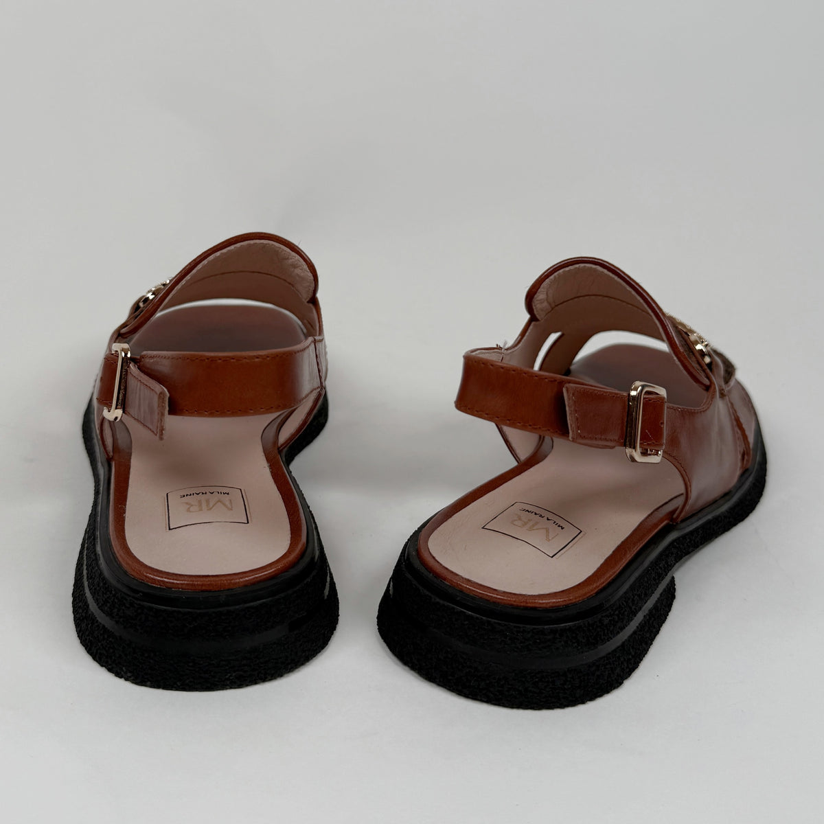 Mila Raine bline tan