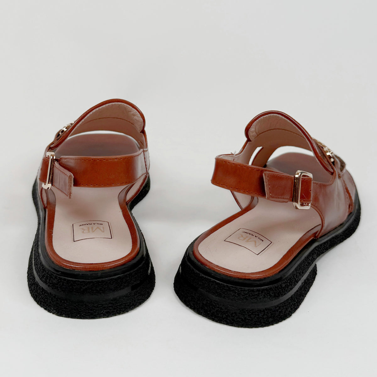 Mila Raine bline tan Mila Raine