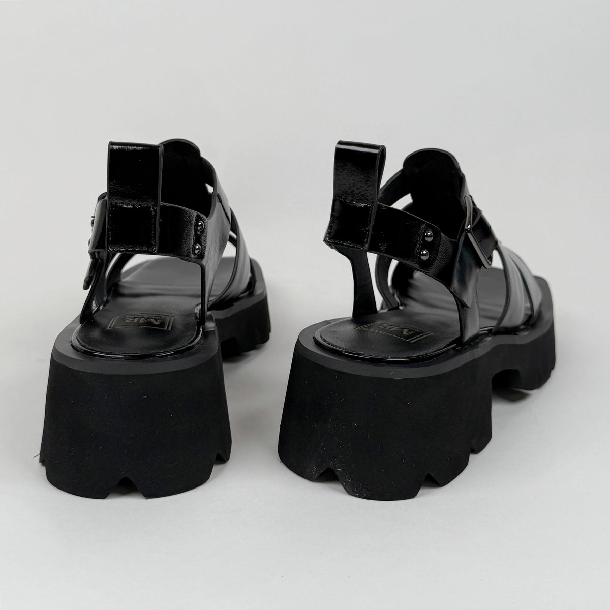 Mila Raine distant black