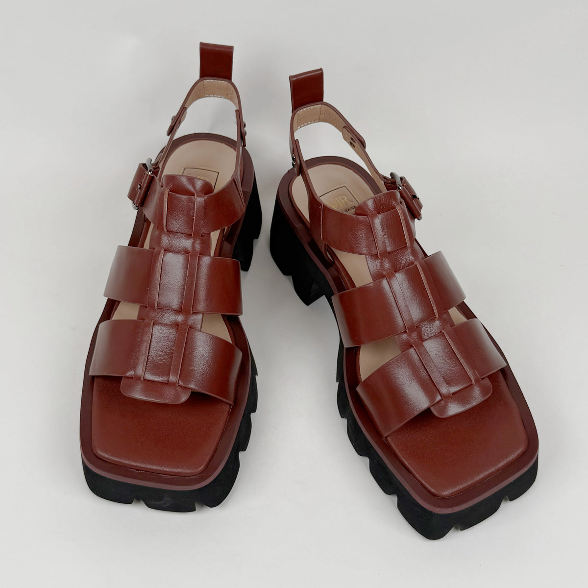 Mila Raine distant brown oiled